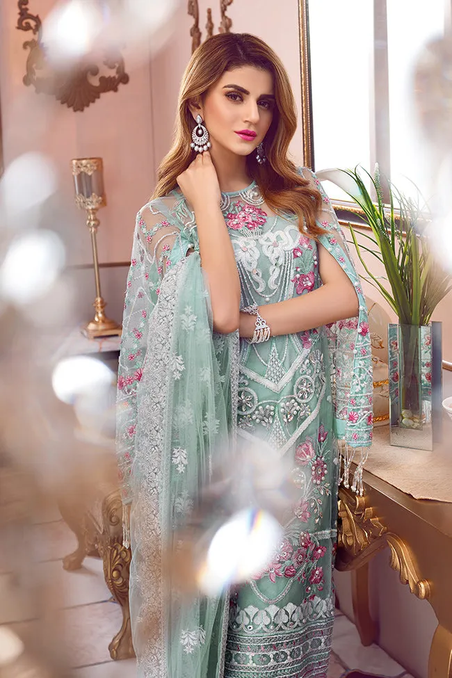 Pakistani designer embroidered net outfit in green color # P2338